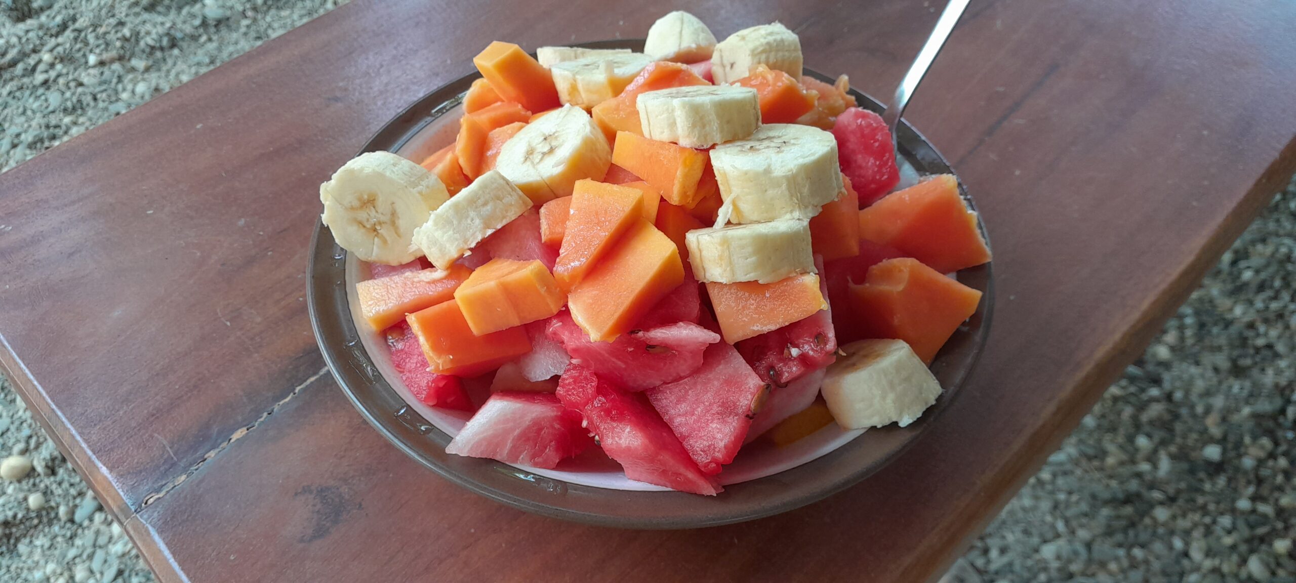 Palawan Philippines Simple Fruit Bowl Rambutan yellow and red Watermelon Papaya Banana